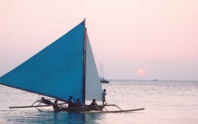 Boat_at_sunset.JPG